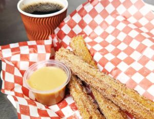 Churros with dulce de leche